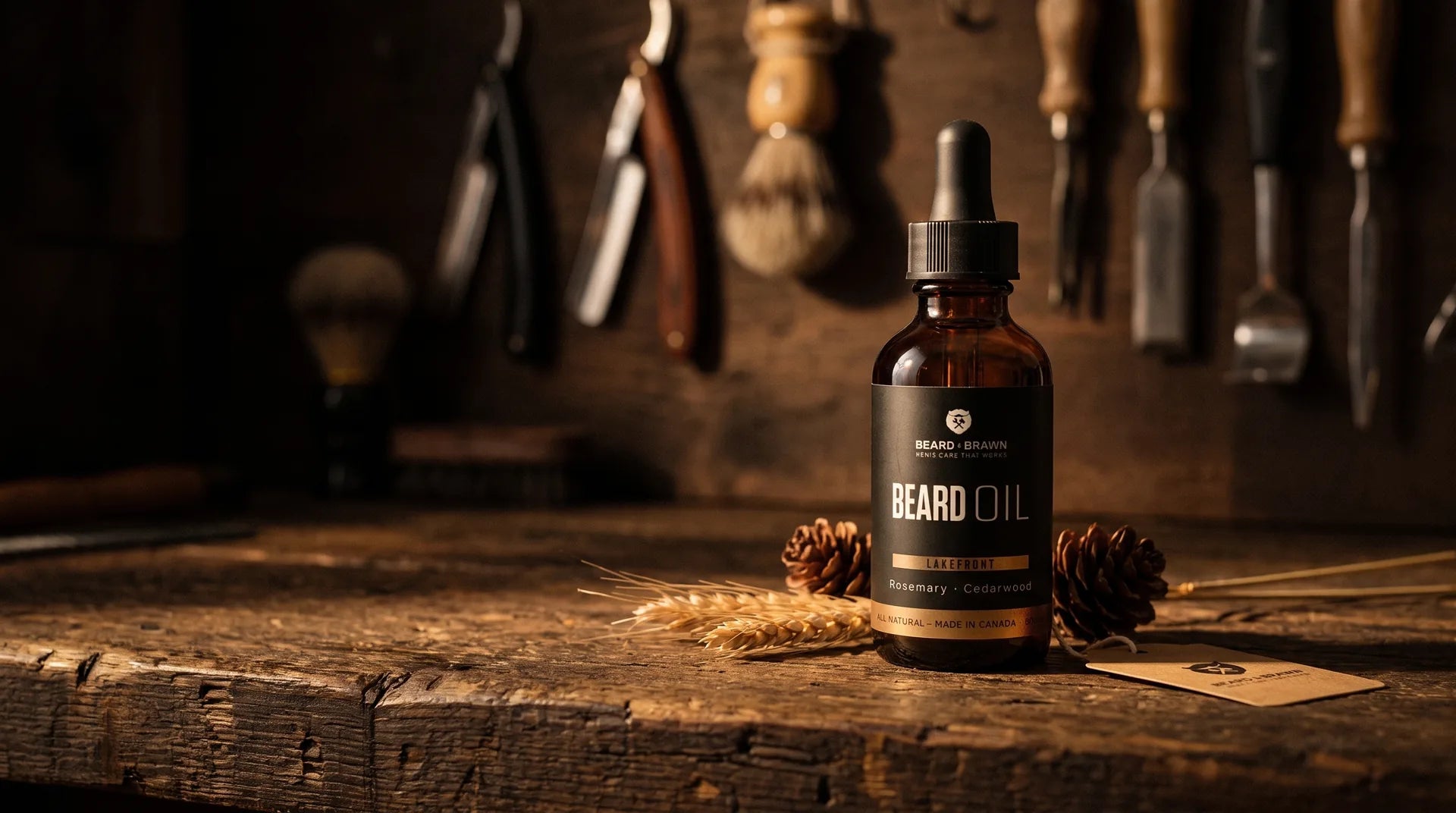 Amber glass beard oil bottle on a dark walnut workbench, lit by warm gold light